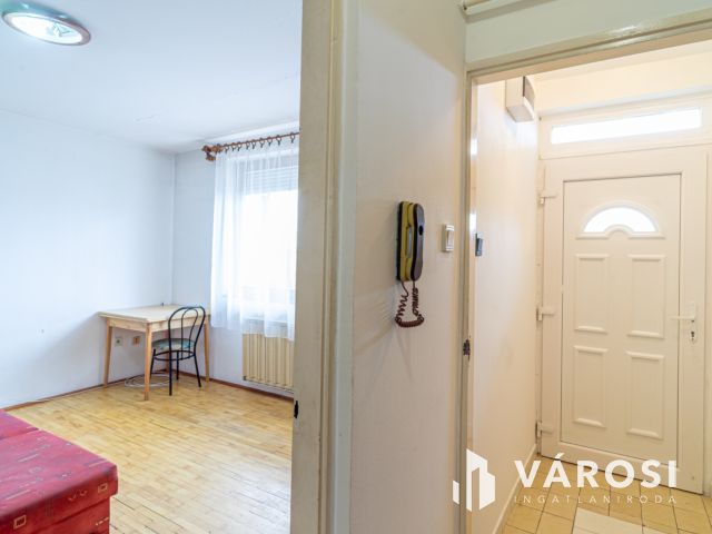 Tégla lakás Móraváros szívében