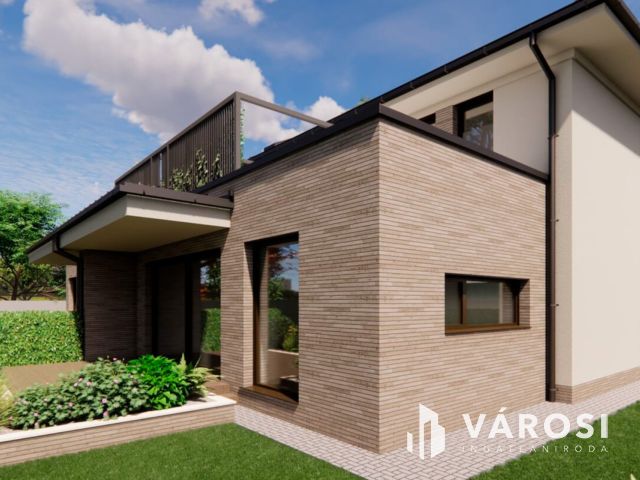 Debrecen csendes kertvárosi részén ELADÓ IKERHÁZ